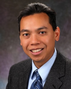 Christopher A. Tan