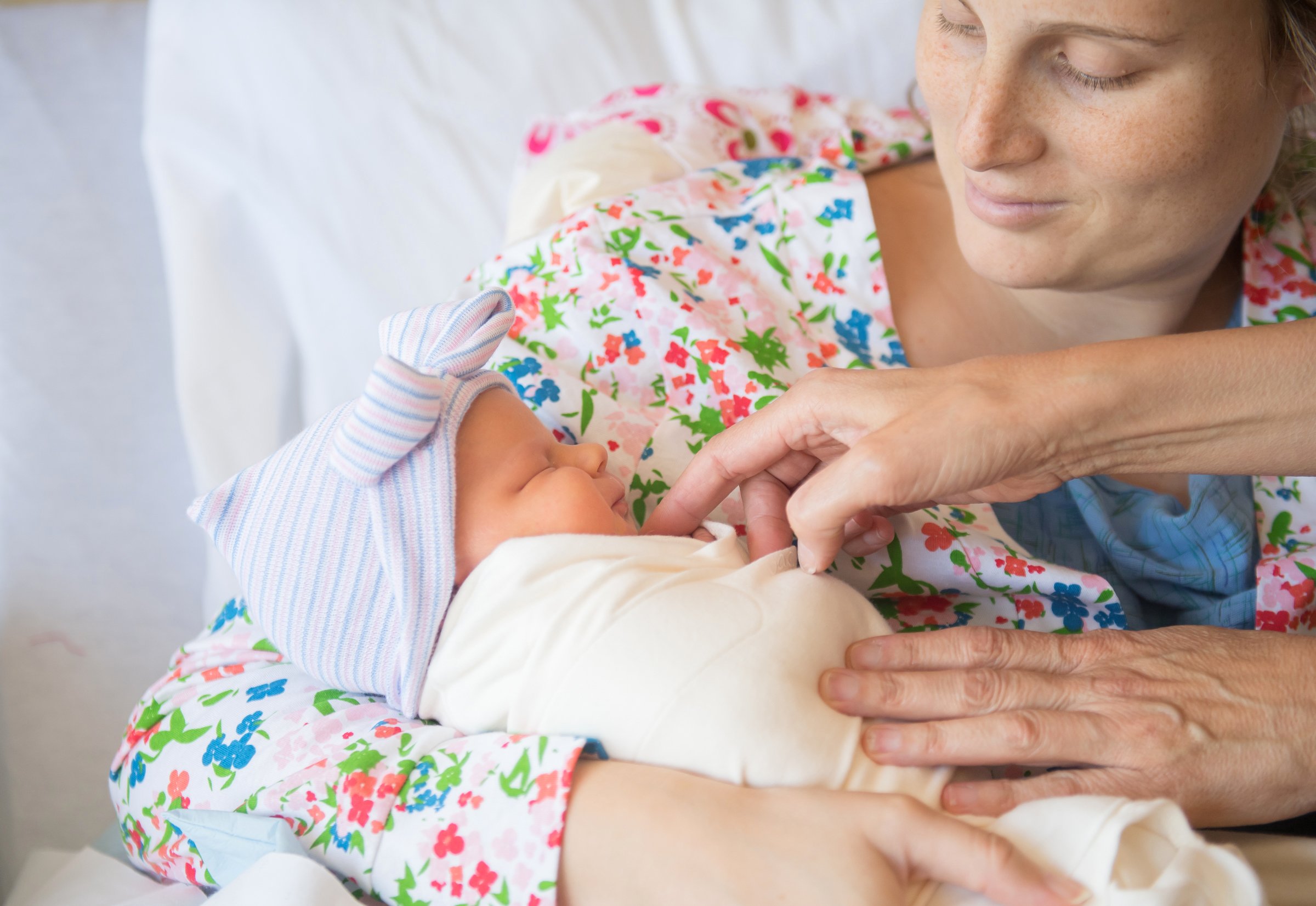 Mother holding newborn baby