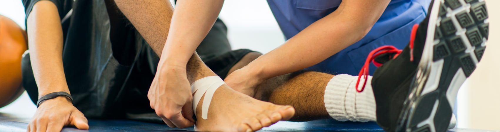 Patient on table getting physical therapy